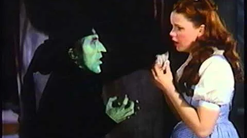 Dorothy facing her fate in the "Wizard of Oz" with Judy Garland, Margaret Hamilton, and Toto