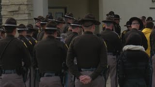 Residents and law enforcement honor fallen trooper as funeral procession arrives in Waukon