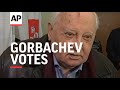 Ex-Soviet leader Gorbachev votes, comments on spy scandal