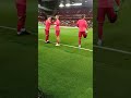 Liverpool players warm up ahead of Leeds United match