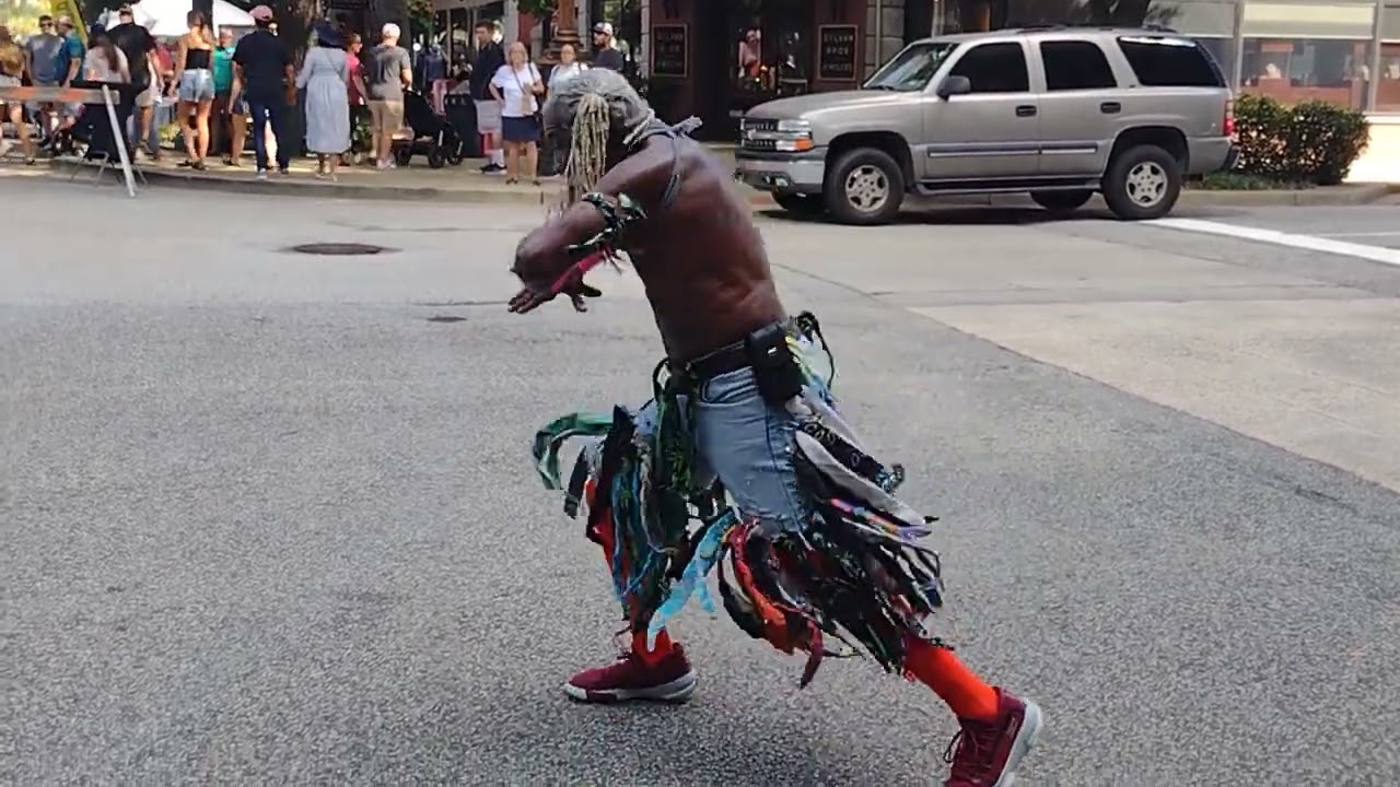 DOG WEST Columbia famous - dancing man on Main Street in Columbia