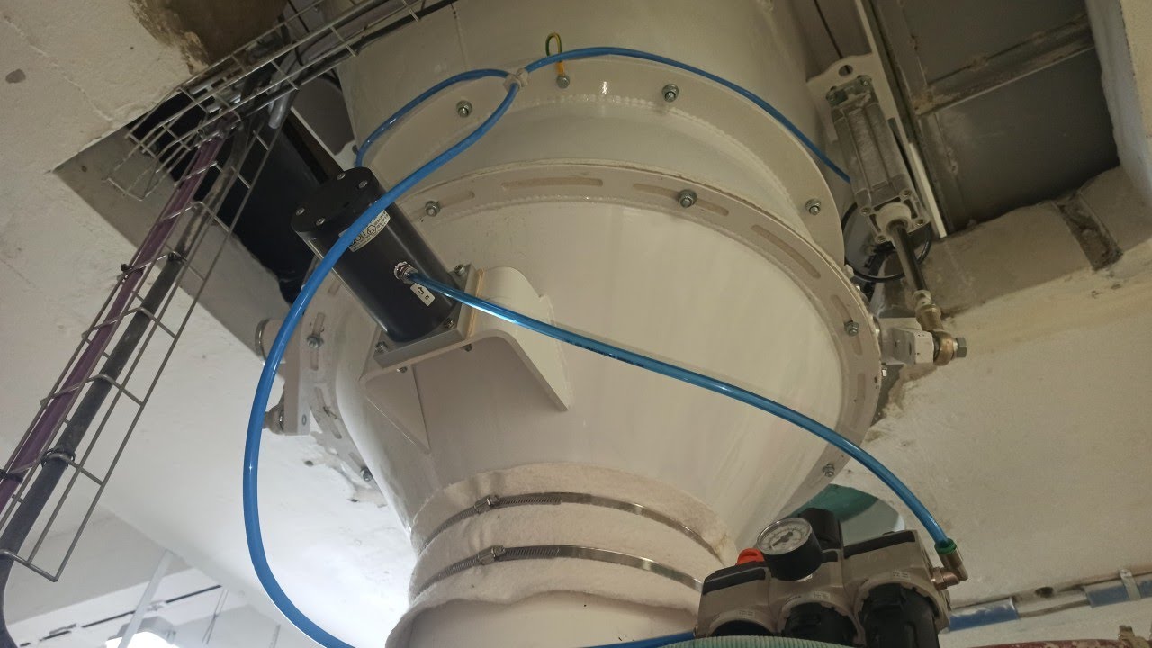 Vibrador Neumático de Pistón Amortiguado OLI en Tolva de Harina