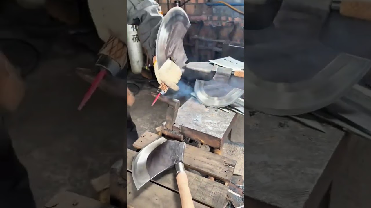 Heating and securing the double bladed axe head onto its handle