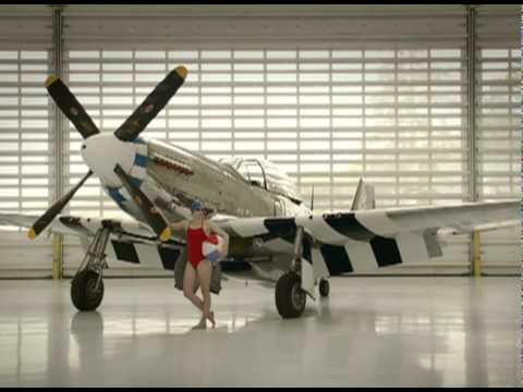 watershed Possibly the first person to lean against a P-51's prop while holding a beachball