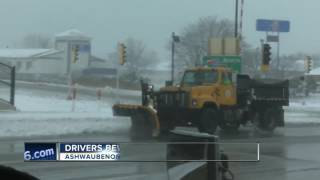 Plow crews working to clear ice and snow from roads