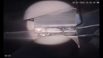 Release of trailing haptic caught in injector