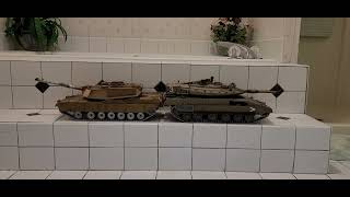 HENG LONG RC TANKS MERKAVA IV and ABRAMS M1A2 side by side comparison both are pro versions.