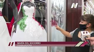 Las fiestas patrias también se apropian de los aparadores de negocios del CH de #Puebla.