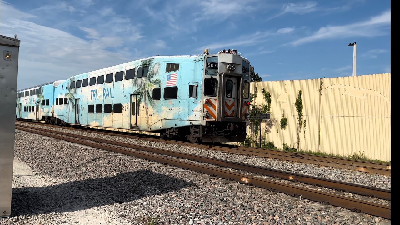 1 amtrak and 1 tri rail Amtrak train. 98 with 43 leading and 76 with A ...