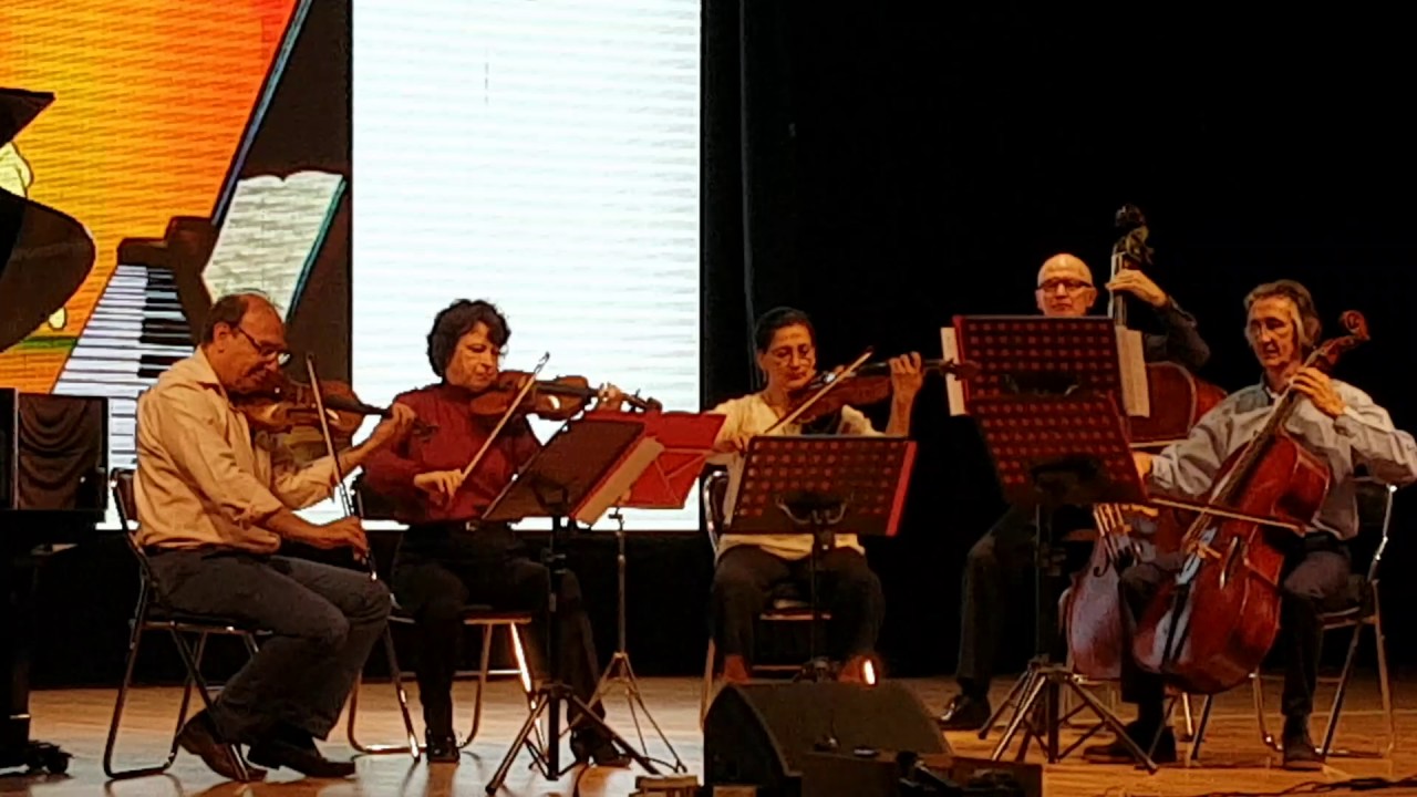 LIAM BLEUSE plays CONCERTINO in a minor, by YURI POLUNIN