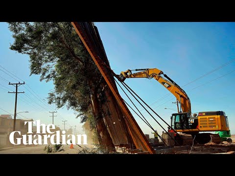 Trump wall between US and Mexico blows over