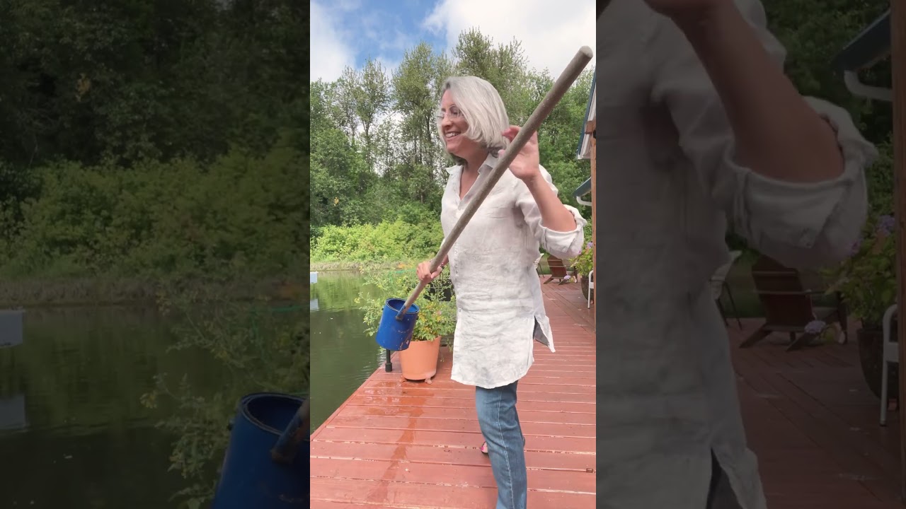 Watering my plants on my floating home. River living! 