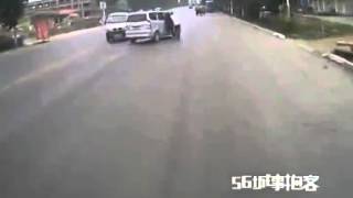 LiveLeak com   Vehicle runs fast on road with man and woman hanging outside