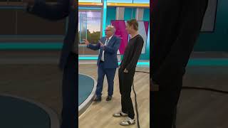 Ed Balls learns how to model on the catwalk