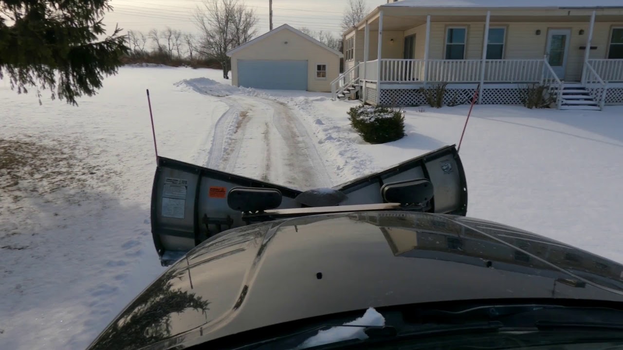 CLEANING UP COMMERCIAL LOTS WITH SNOWDOGG V PLOW