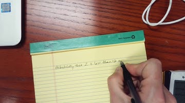 Finding area under standard normal curve using a TI84