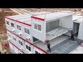 Vidéo aérienne par drone du grutage et montage de cabanes de chantier