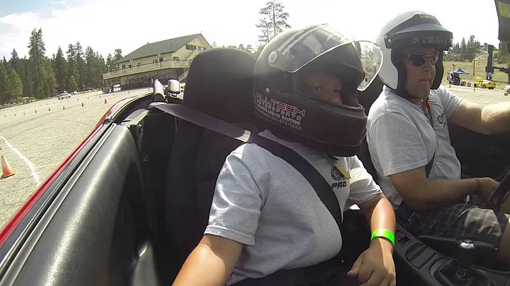 Aiden ridiing in Max's Miata