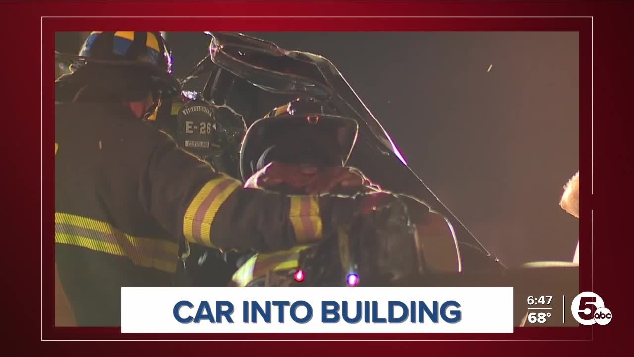 2 rescued after SUV crashes into building - YouTube