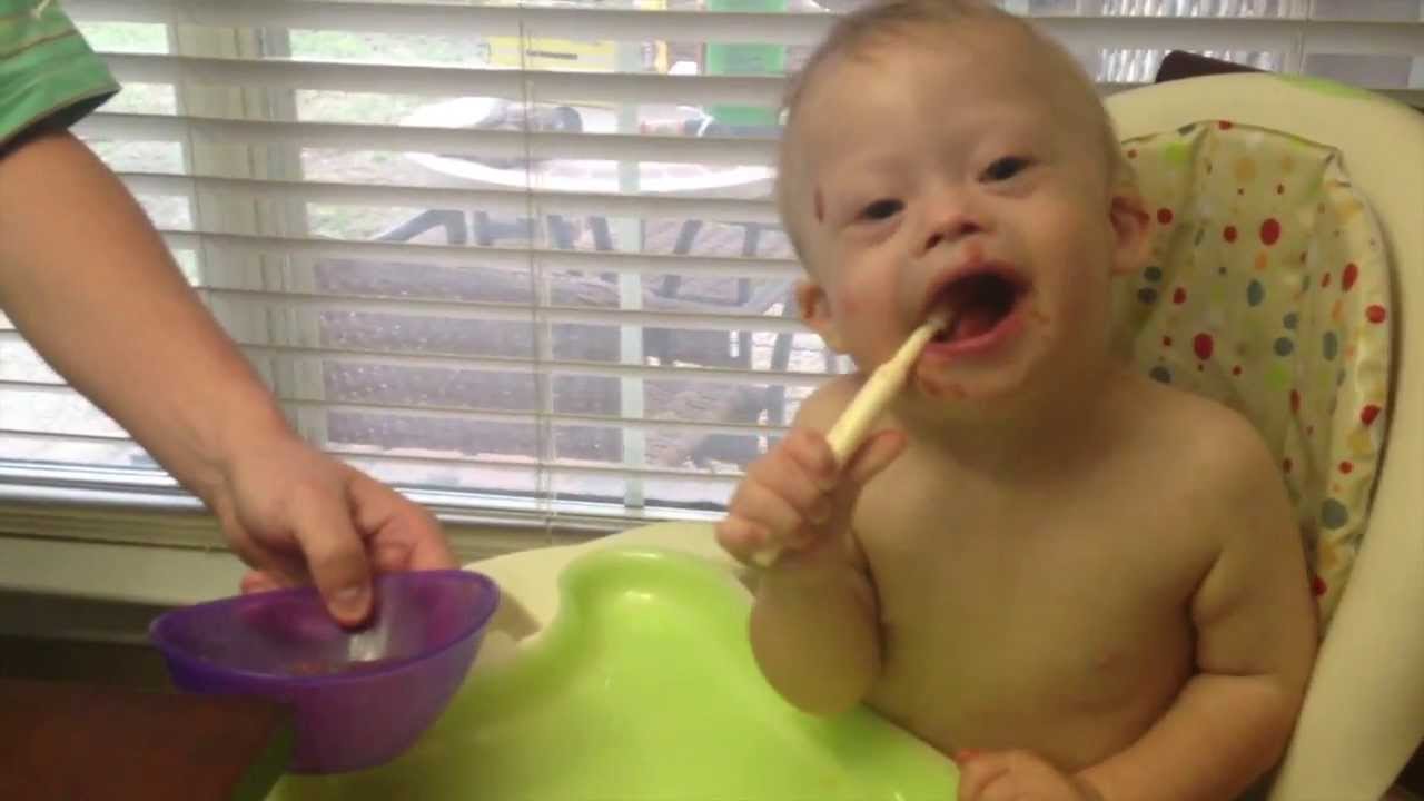 Baby Wtih Down Syndrome Eating By Himself For The First 