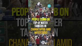 Delhi Water Crisis Turns Chaotic, People Climb On Top Of Water Tankers