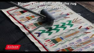 Blowing The Water Out Of The Rug Using Air Compressor - Airloom Tucson Oriental Rug Washing Co