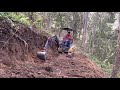 Mini excavator making trails