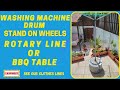 Rotary washing line or BBQ table out of old washing machine drum