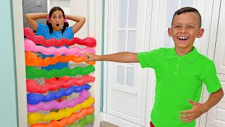 sofia and max play with balloons