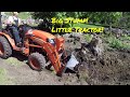 #288 Kubota B2601 compact tractor. Stump bucket. Stump'in down in the meadow. outdoor channel.