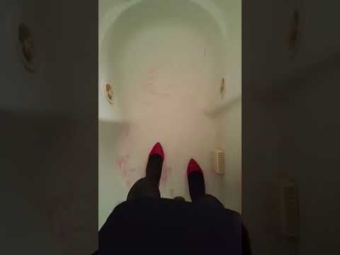 Sexy high heels slipping while wearing tight black skirt (re-upload)