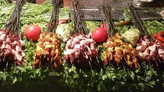 Chicken brochettes and merguez sausages in Marrakech