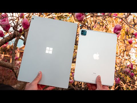 Video: Verschil Tussen Microsoft Surface Tablet En Apple Nieuwe IPad