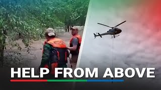 Help from above: Helicopter rescues tourists from flooded Kenyan nature reserve | ABS-CBN News