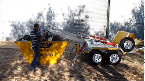 Loading of skip by Skipgo mini skip trailer(Manufactured by SkipRent)