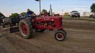 Farmall Super H pulling at the Western Missouri Antique Tractor & Machinery Association's 45th Show