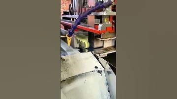 Industrial Robot Arm in Action: Precision on the Production Line