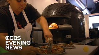 Deaf staff serves up pizza at top California restaurant Mozzeria