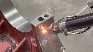 Repair of a damaged bearing surface of a gear box housing by laser cladding