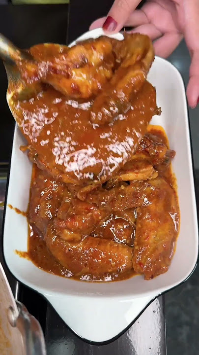 Cook chicken with coconut milk sauce and sambal calamari pete