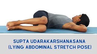 Supta Udarakarshanasana Lying Abdominal Stretch Pose
