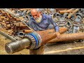 A 76-year-old hardworking craftsman manufacturing axles for heavy-duty vehicles