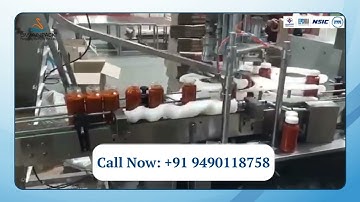 PICKLE BOTTLE FILLING MACHINE MANUFACTURED BY SWANPACK.