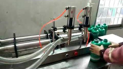 Self priming dual head piston filling machine for 1000g