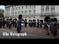 Changing of the guard plays &#39;Gangnam Style&#39; outside Buckingham Palace