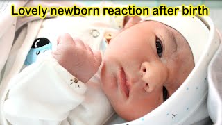 Cute and smart newborn baby who quickly opened his eyes and connected with new world