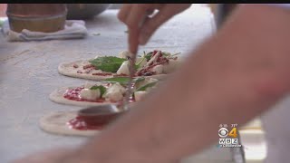 Hundreds Waited In Long Lines For Their Delicacy--Pizza