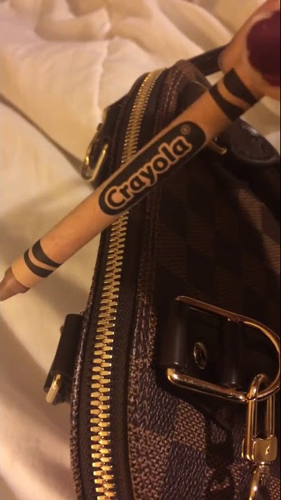 Fixing an LV zipper with CHAPSTICK??, Louis Vuitton