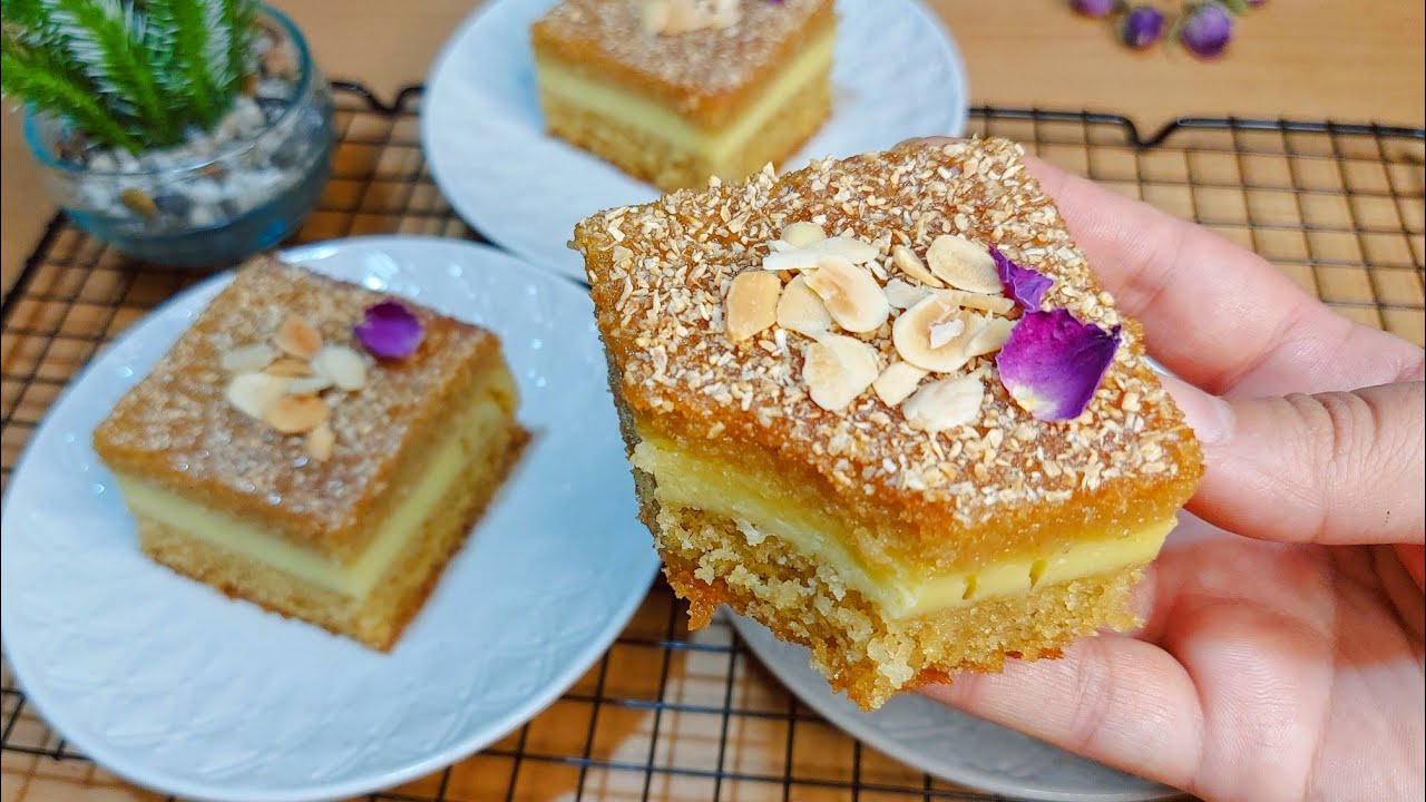 بسبوسة بالكريمة كتذووب فالفم مزيج بين الفاني و القهوة شي حاجة طووب متشبعوش منها