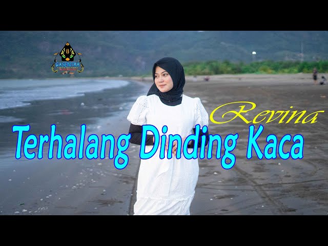 REVINA ALVIRA - TERHALANG DINDING KACA (Official Music Video) class=